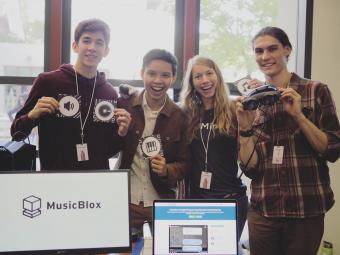 Team photo of MusicBlox, with Mines students Nhan Tran and Natalie Kalin at center