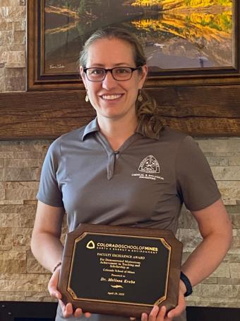 Melissa Krebs with award plaque