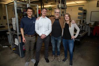 Craig with Adam Savage and 2 students in Advanced Manufacturing lab
