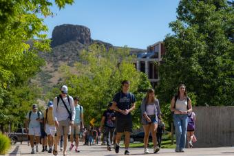 Students walk on campus on first day