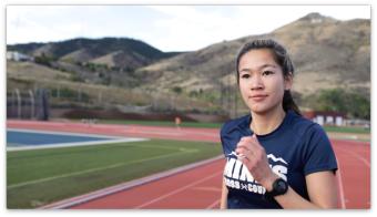 Zoe Baker runs on the track at Mines