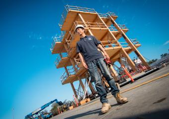 Shiling Pei in front of the tallwood building under construction