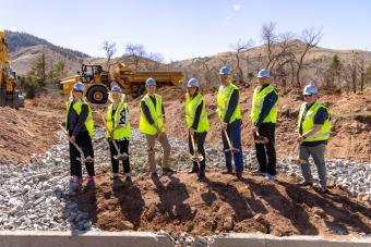 Mines officials with ceremonial shovels