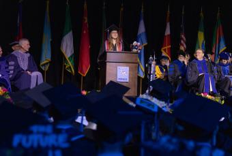 Female student speaks at commencement 