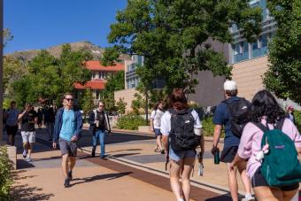 Students walk on campus during passing period