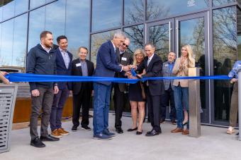 President Johnson and Mike Beck cut ribbon on Beck Venture Center