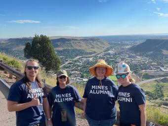 Mines alumni volunteers pose at 2023 M Climb