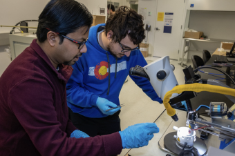 students work in quantum engineering lab at Mines