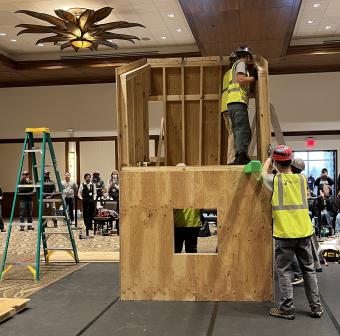 Mines students build their structure at competition