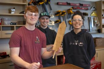 Owen Randall, Nicholas Elliott and Ivanna Martinez work on prototype in Labriola