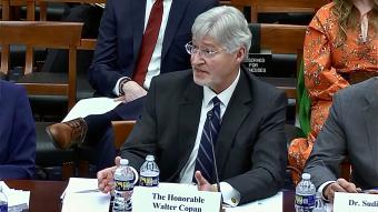 Walt Copan sitting at table testifying before House Committee