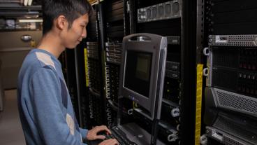 Student works on supercomputer in CTLM