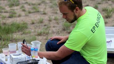 Student conducts experiments in the field