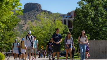 Students walk on campus on first day
