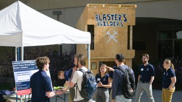 Students talk about their wood building at Capstone Design Showcase