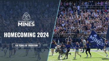 Crowd of spectators in a stadium at Colorado School of Mines Homecoming 2024, with cheerleaders, students, and the school mascot running on the field carrying Mines flags. The image is divided in two halves, with the left side featuring the Colorado School of Mines logo and the text 'Homecoming 2024' above a banner that reads '150 Years of Tradition.'