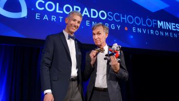Mines' President Paul Johnson, Bill Nye and Blaster the Burro in their matching bow-ties, all part of the Bill Nye official bow-tie collection.