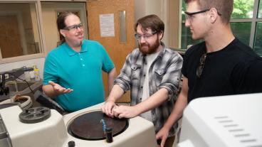 MME Associate Professor Jeff King, left, and students Ryan Collette and Charlie Becquet conduct testing in the lab.