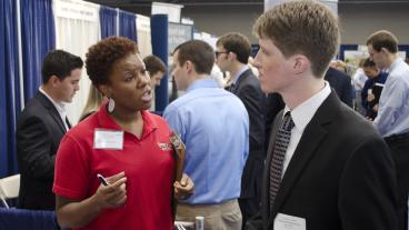 A Colorado School of Mines student meets with an employer at the Fall 2012 Career Day.
